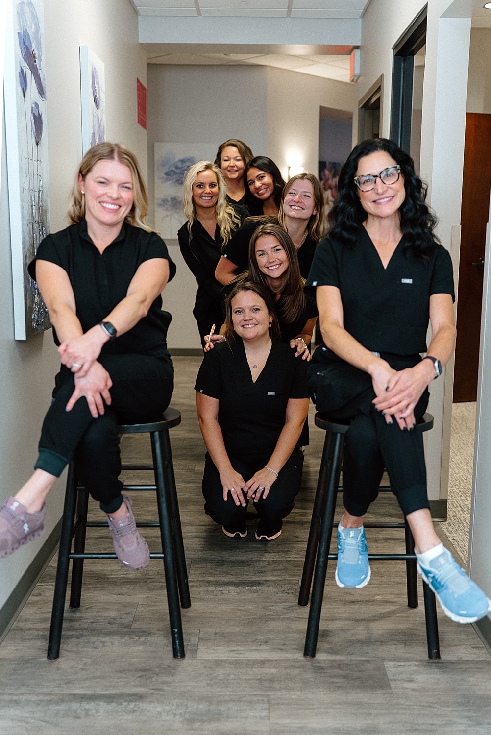 Group of healthcare professionals smiling together indoors