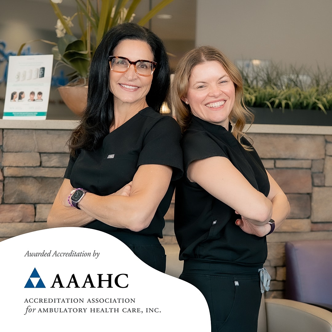 Healthcare professionals celebrating accreditation achievement.